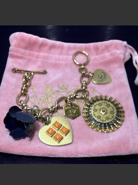 JUICY CONTURE Gold-Tone Charm Bracelet with Navy, 
Y2K Orange and Gold Accents